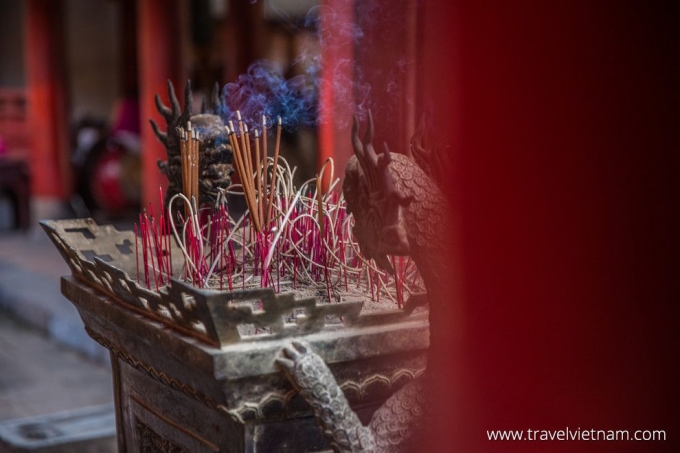 Incense burns outside Great House of Ceremonies