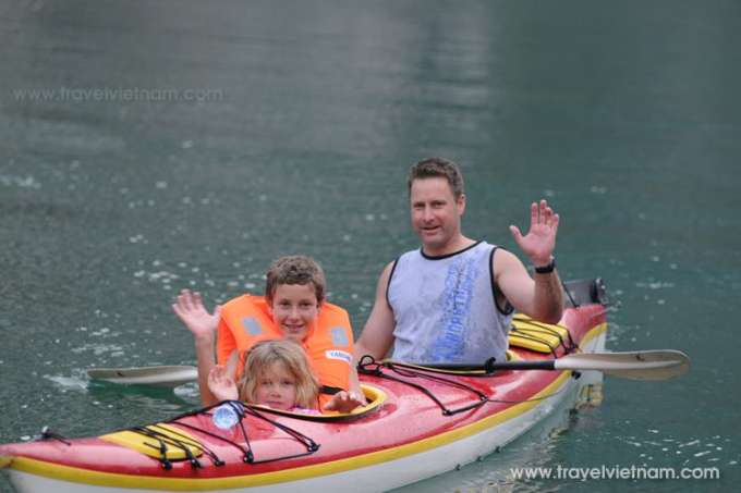 Foreign tourists kayaking on Halong bay