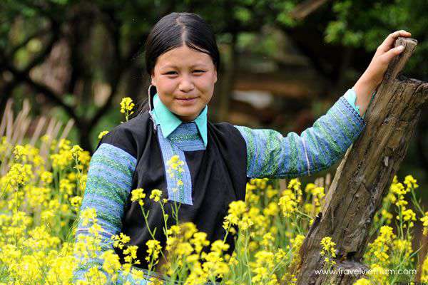 An ethnic girl among flowers