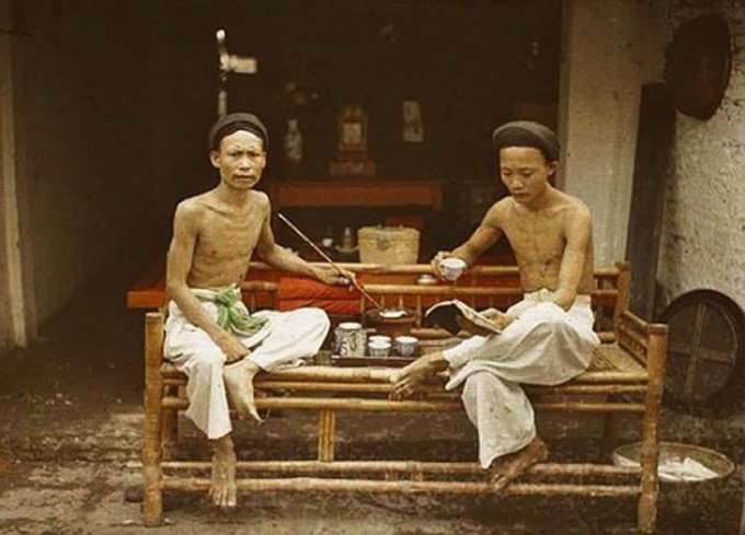 Tonkin, Hanoi, Two opium-smokers drinking tea, 1915.