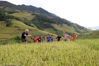 A foreign tourist and local children