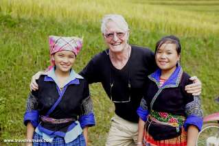 A foreign tourist and local children