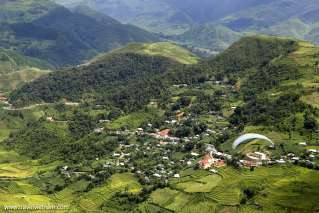 A small village embraced by green