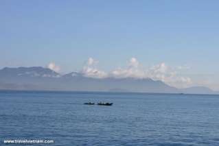 Small boat on the endless ocean