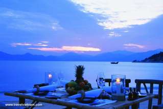 Dinner on the beach with amazing sunset 