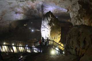 A giant stalagmite in Paradise Cave