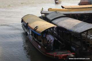 Anchored boats by river side