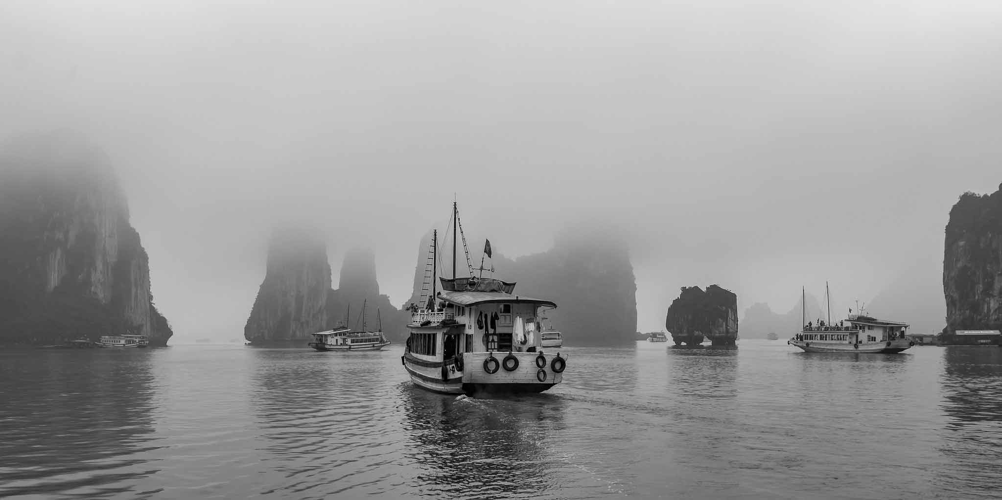 A view of Ha Long Bay covered in mist during winter