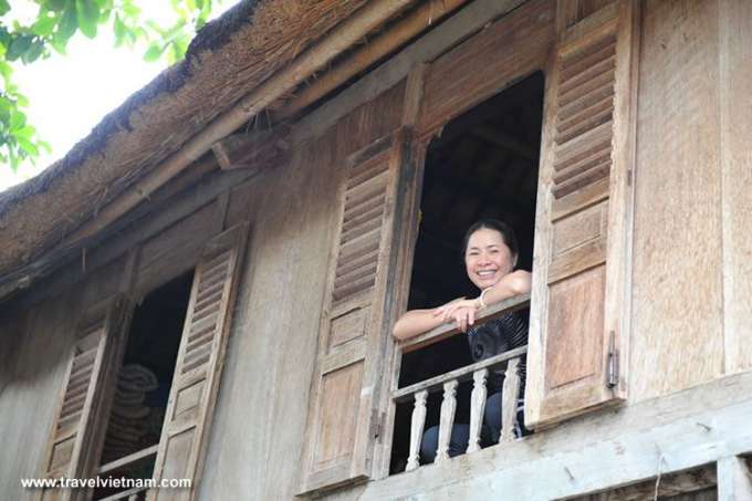 A tourist in a stilted house